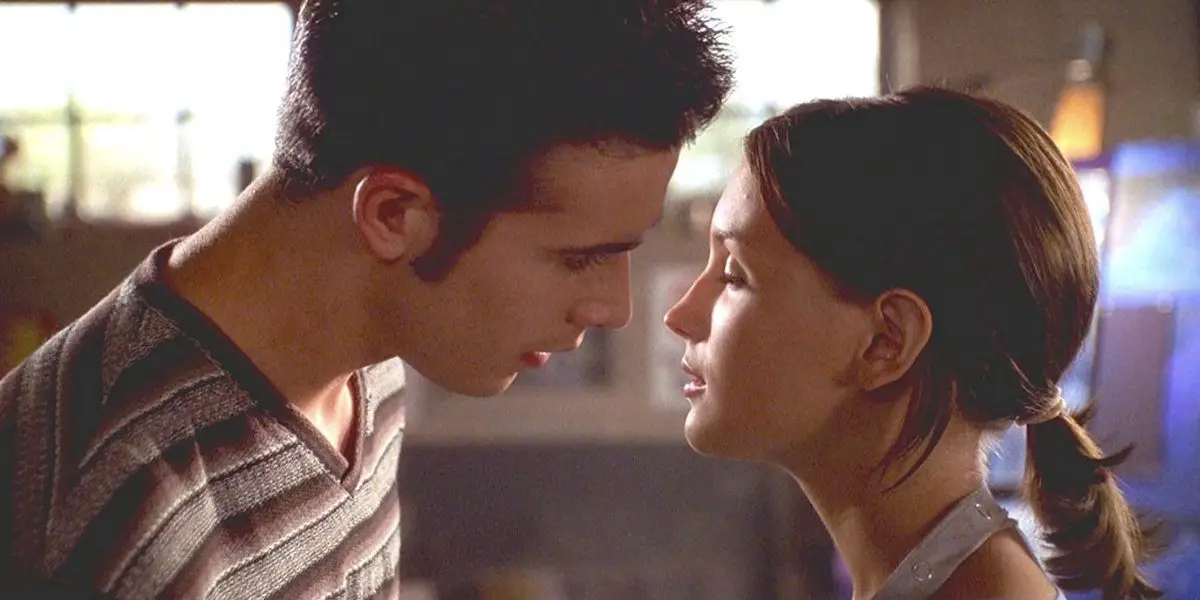 Zack and Laney standing close to one another, about to kiss, in She's All That