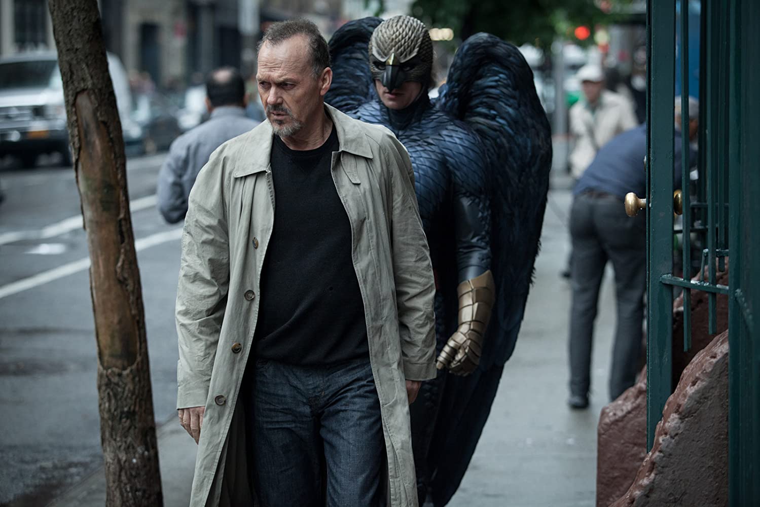 The former Birdman character appears to follow Riggan in his mind on a busy street.