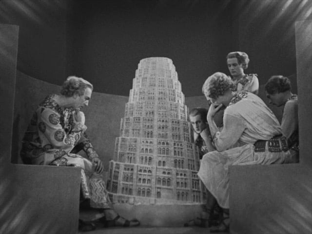 The architects gazing at a model of Babel