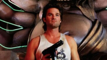 Jack Burton stands in Lo Pan's domain with a gun