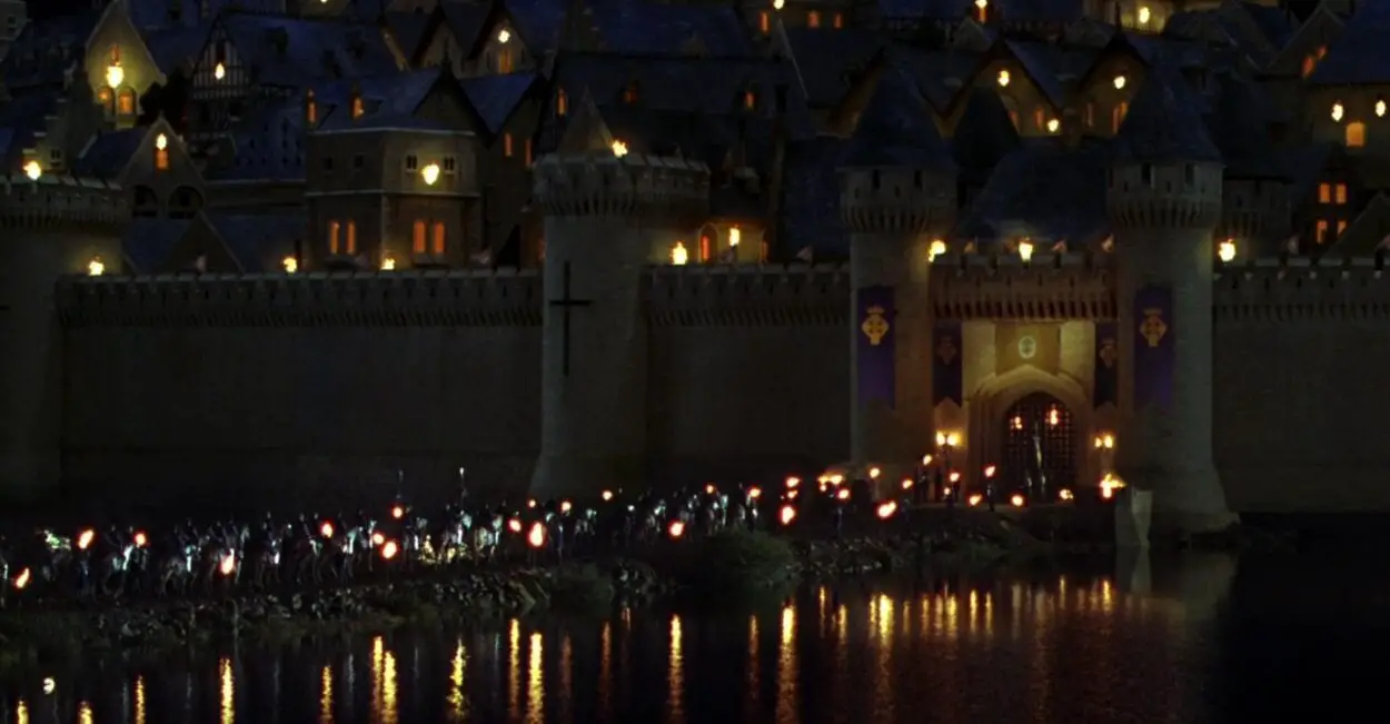 A caravan of soldiers and royalty arrive at Camelot