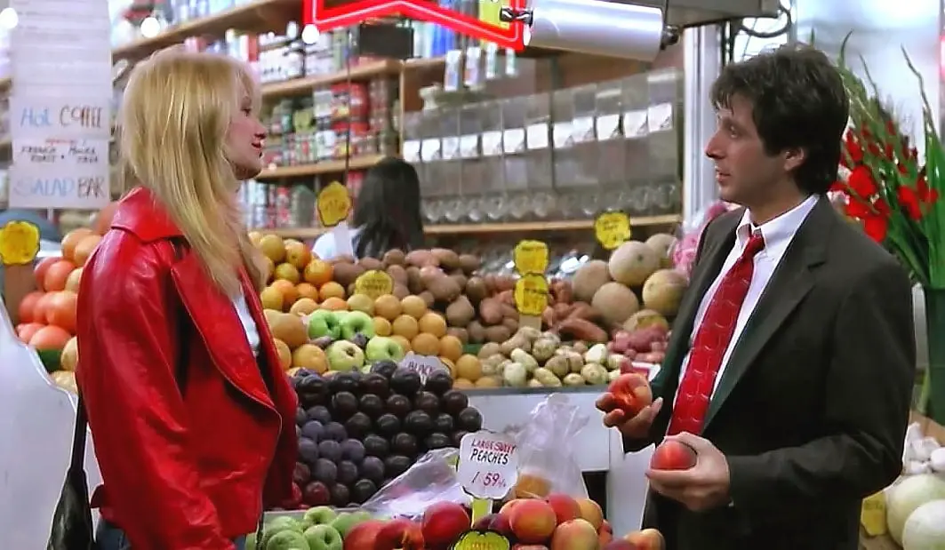 Frank Keller charms Helen Cruger at a New York grocery store