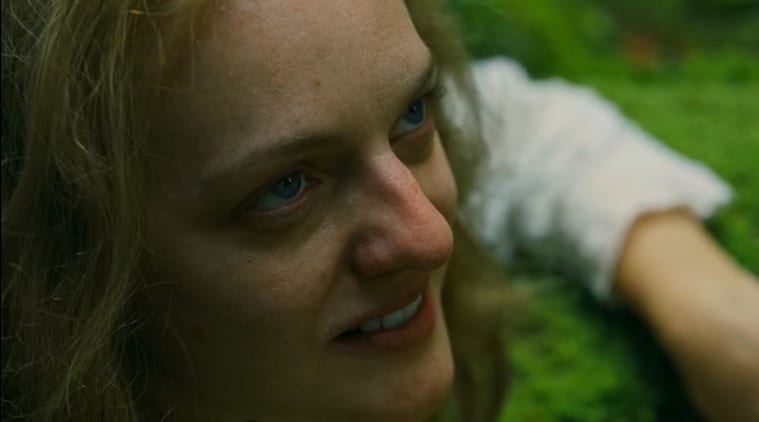 Extreme close-up of Shirley (Elisabeth Moss) grinning up at Rosie (Odessa Young)