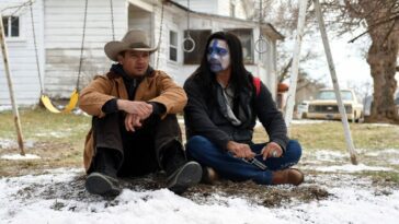 Cory (Jeremy Renner) consoles Martin (Gil Birmingham) in Wind River