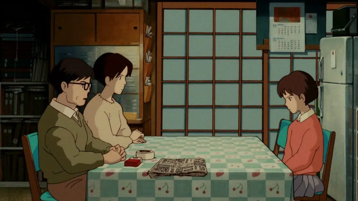 Shizuku discusses her future with her parents at the kitchen table