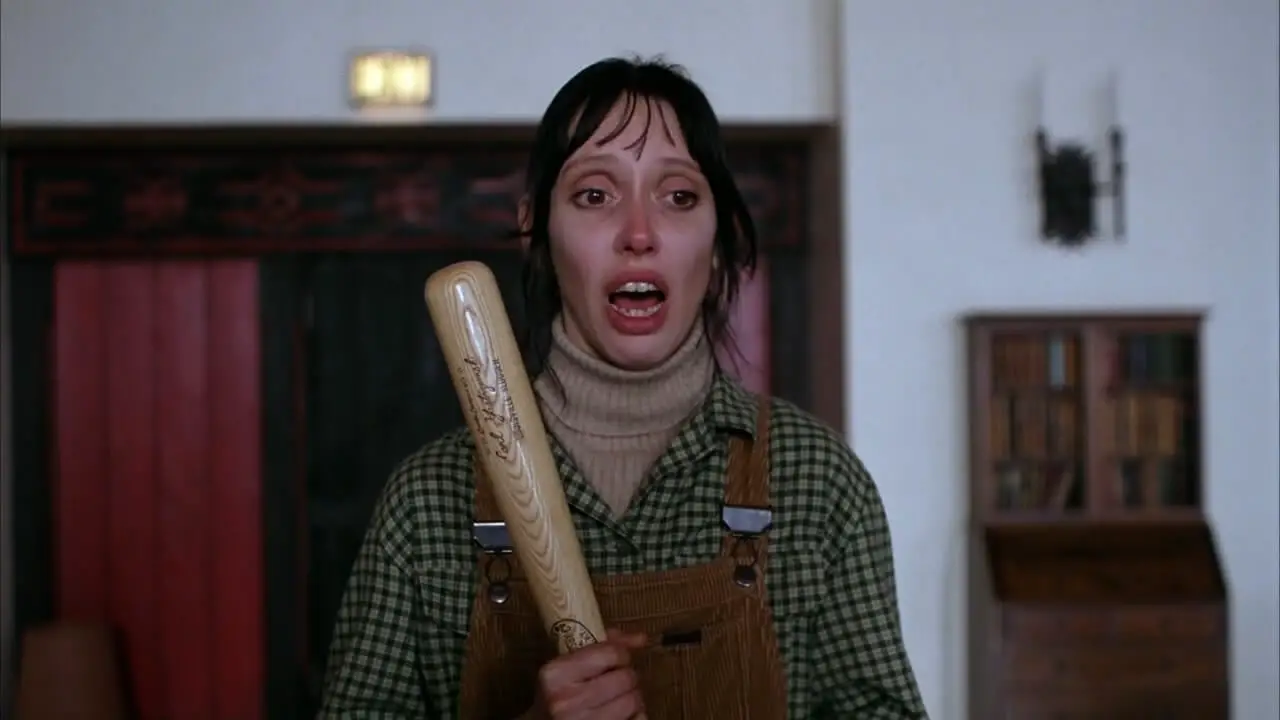 Shelley Duvall as Wendy in The Shining, holding a baseball bat
