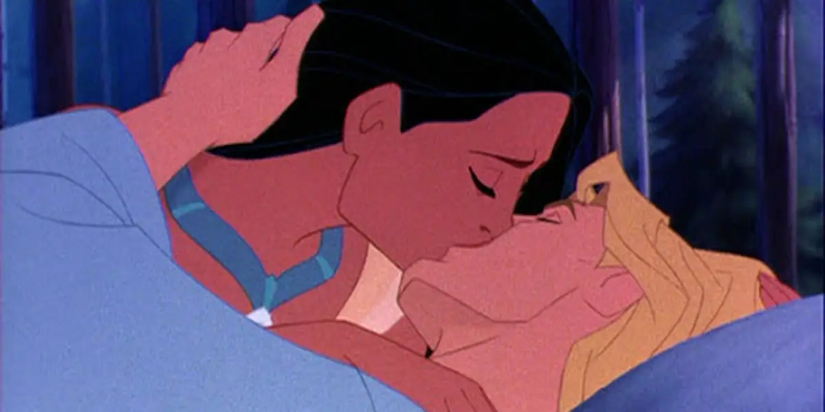 Pocahontas and John Smith kiss each other farewell