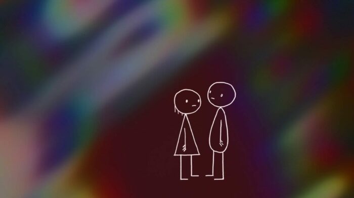 Two stick figures; the one on the left, a woman in a dress with a blank expression, stands in front of a man bearing the same look. They are in front of deep maroon coloring surrounded by an oil-spill-like rainbow mess.