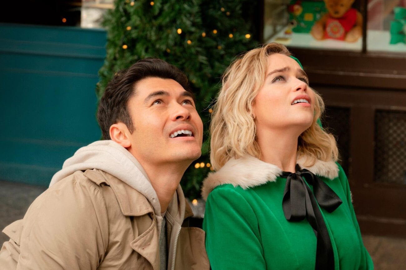 Henry Golding and Emilia Clarke look skyward in Last Christmas