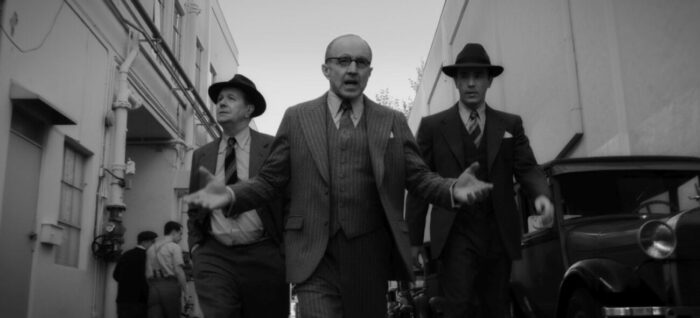 The Mankiewicz brothers follow Louis C. Mayer through the backlot.