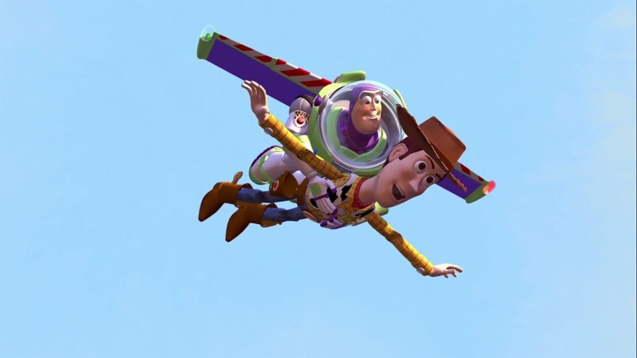 Buzz holds Woody while they fly or "fall with style" in the film's iconic climax