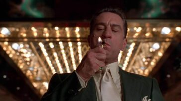 Ace Rothstein lighting a cigarette