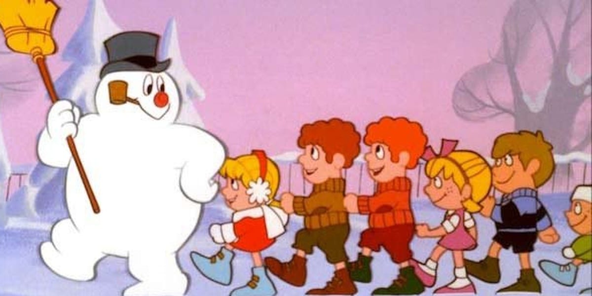 Frosty the Snowman leading a group of kids as he holds a broom high in the air