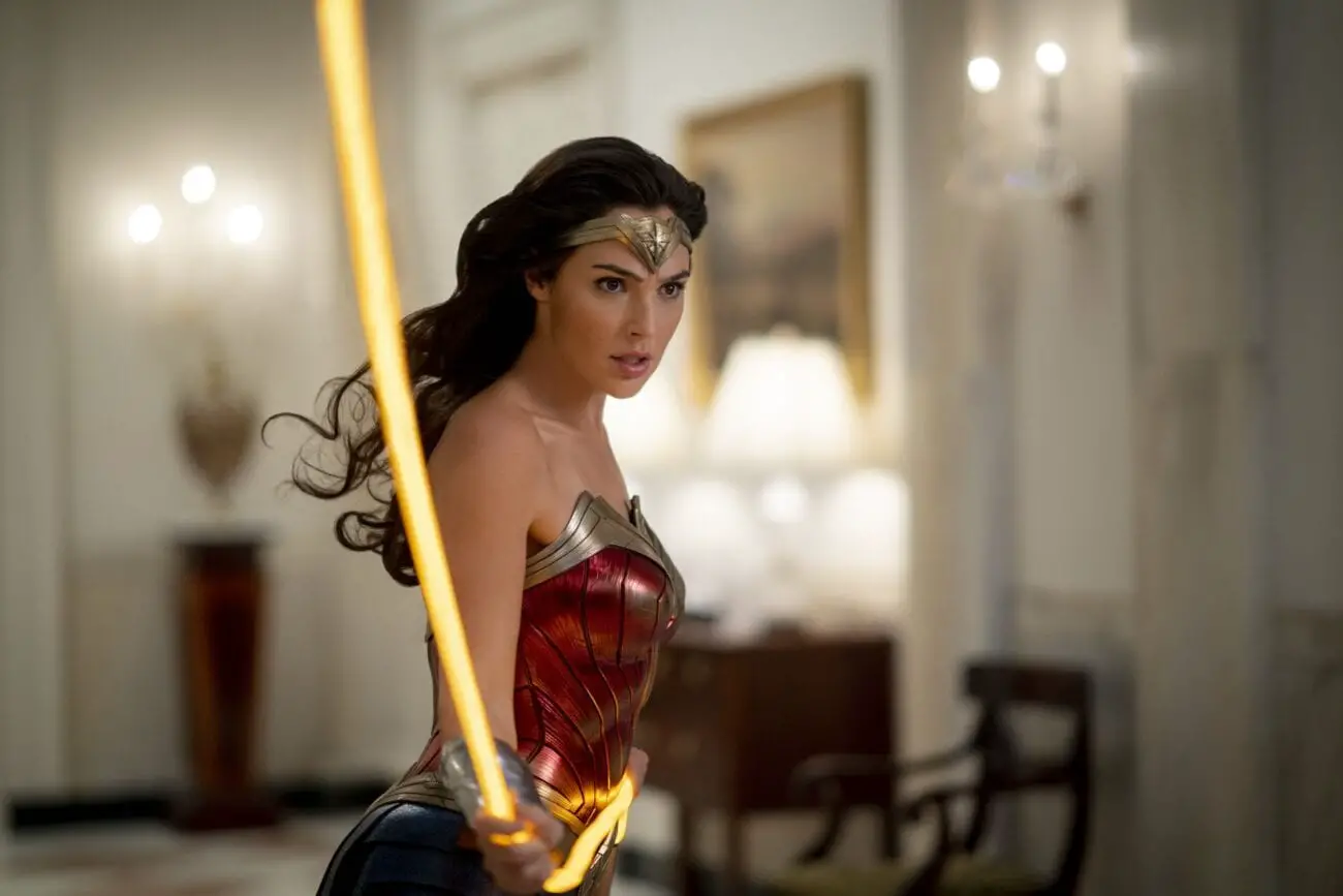 Wonder Woman twirls her lasso down a White House hallway.