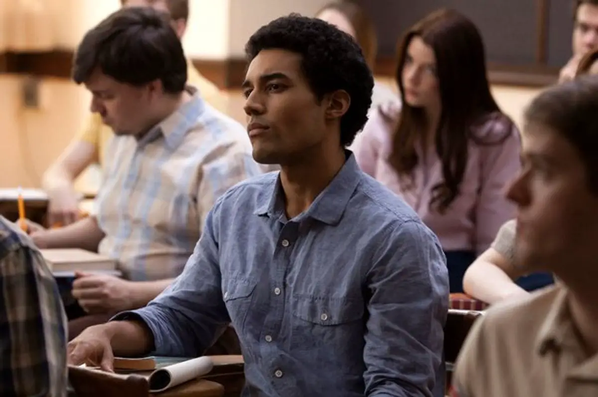 Barry listens intently from his desk in class.