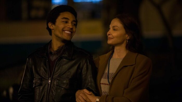 Barry talks to Ann on a street at night.