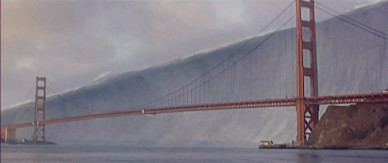 A large tidal wave approaches the Golden Gate Bridge
