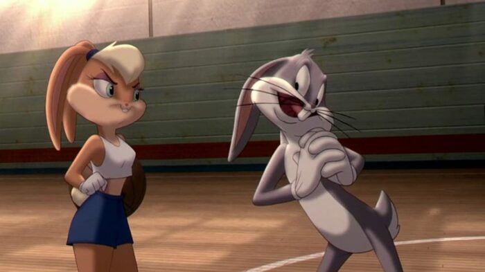 Lola Bunny looks dismissively at Bugs Bunny as he professes how attractive he finds her
