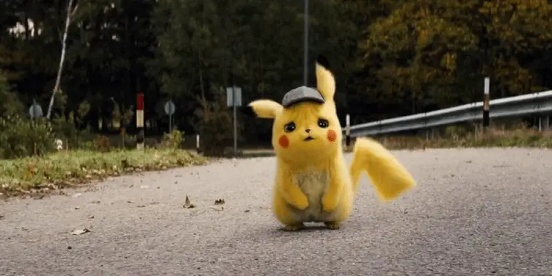 Pikachu stands in the middle of a road looking sad