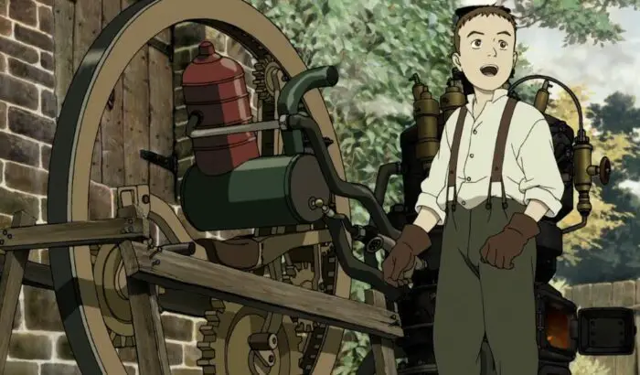 Ray stands next to his steam powered wheel vehicle