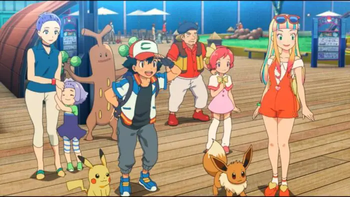 Ash and his Pikachu stand with several other characters and Pokemon on a boardwalk