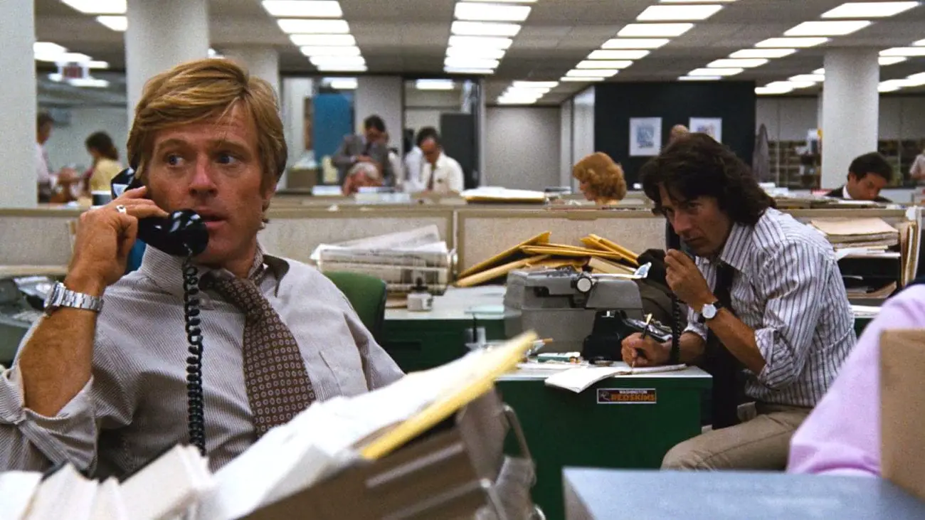 Bob Woodward and Carl Bernstein work away at their desks at the Washington Post