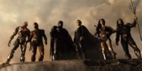 Cyborg, Flash, Batman, Superman, Wonder Woman, and Aquaman look down at their work in Zack Snyder's Justice League