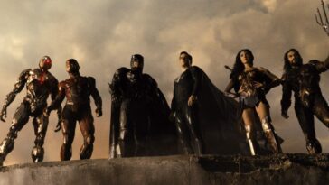 Cyborg, Flash, Batman, Superman, Wonder Woman, and Aquaman look down at their work in Zack Snyder's Justice League