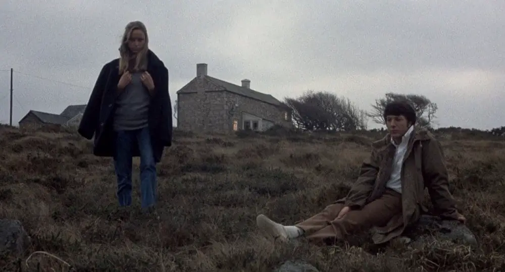 Amy (Susan George) and David Sumner (Dustin Hoffman) on the moors in Straw Dogs (1971)
