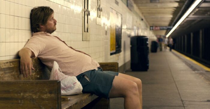 In Rick Alverson's "The Comedy," Tim Heidecker, playing Swanson, lazily leans on a subway bench in New York City, his belly bulging out.