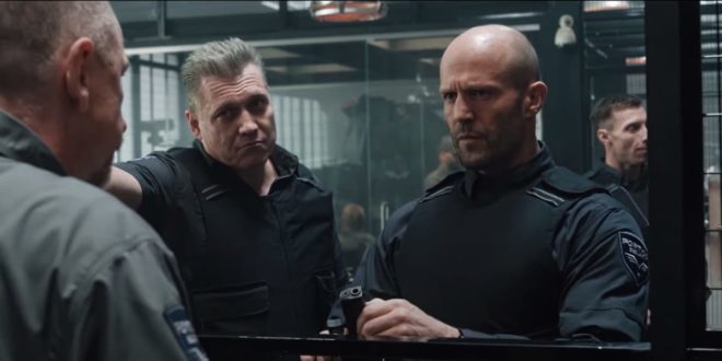 Bullet (Holt McCallany) takes H (Jason Statham) to get his company issued gun on his first day working at a cash truck company.