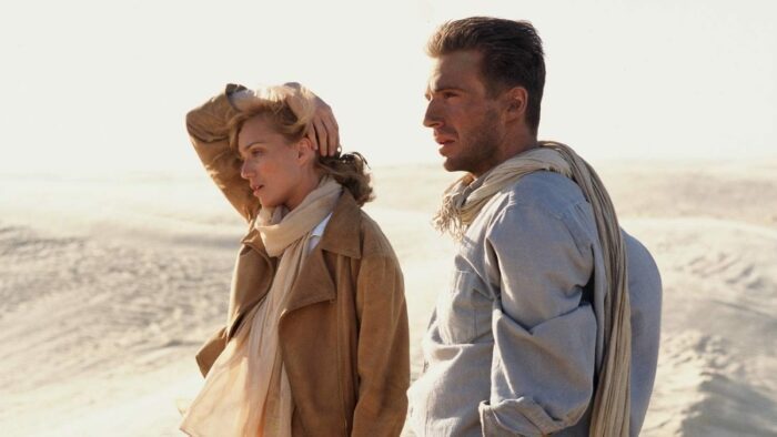 Almásy and Katharine standing stranded in the Egyptian desert in The English Patient 
