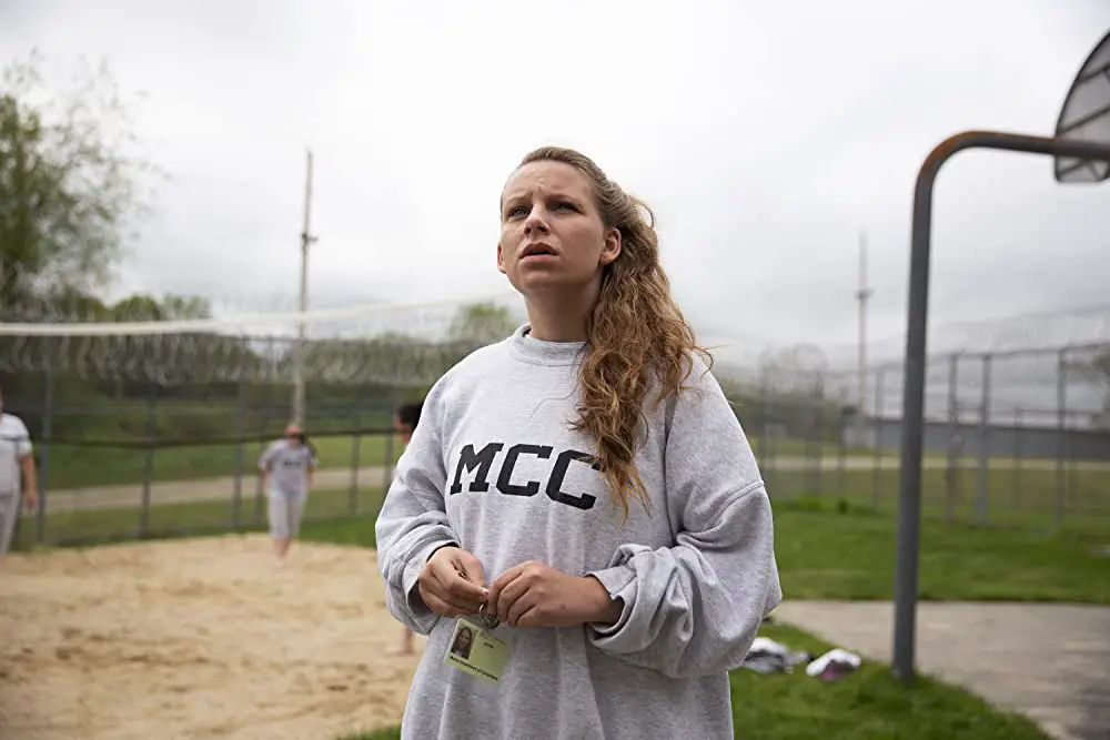 Jacinta Hunt is depicted wearing a sweatshirt with the letters MCC at Maine Correctional Center