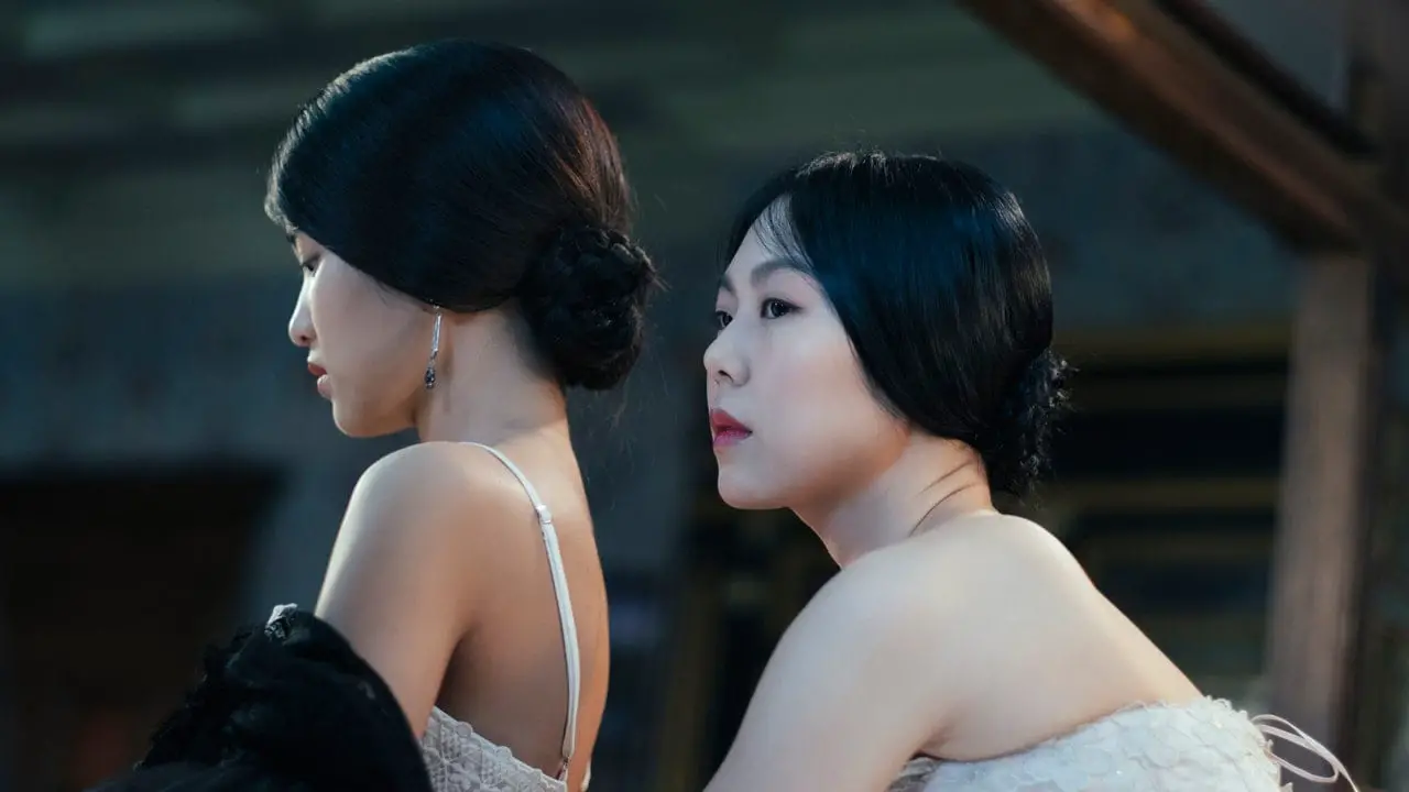 The Handmaiden (2016) Lady Hideko (Kim Min-hee) dresses Sook-Hee in her clothes 