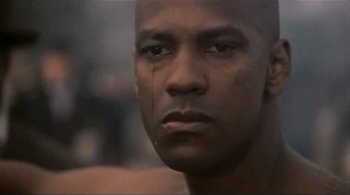 In this image from Glory, Denzel Washington is depicted as Private Trip shedding a single tear.