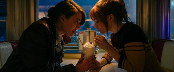 Scarlet (Lena Headey) and young Sam (Freya Allan) share a milkshake.