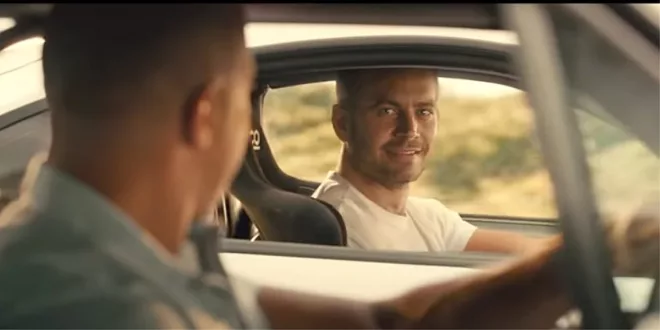 Dominic Toretto (Vin Diesel) stares at Brian O'Connor (Paul Walker) who just challenged him to one last race.