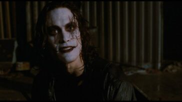 Eric Draven looks over to a friend while wearing facepaint.