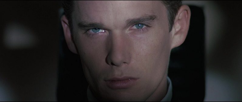 In this image from Gattaca, the character Vincent Freeman (Ethan Hawke) is depicted gazing directly at the camera in close-up.