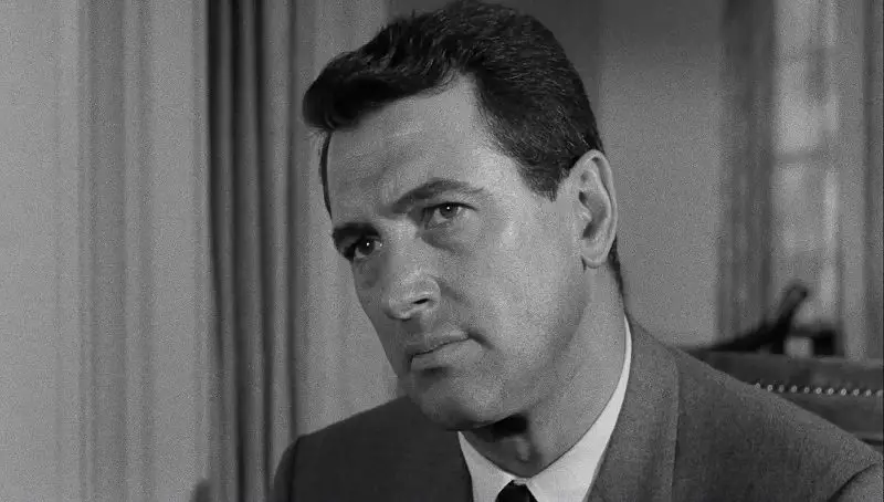 In this image from Seconds, Rock Hudson is depicted in close-up as Antiochus "Tony" Wilson while seated in a living room.