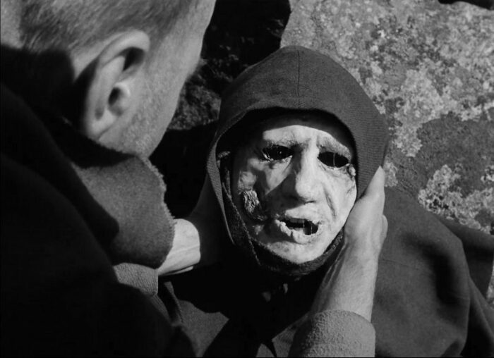 In this image from The Seventh Seal, Jons (played by Gunnar Björnstrand) is depicted holding a plague victim's corpse.