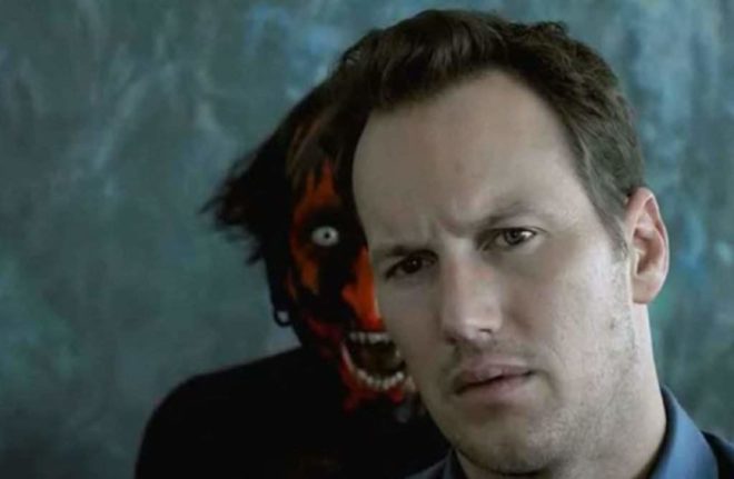 The Lipstick-Face Demon that haunts the Lambert house lingers over the shoulder of the family's patriarch, Josh Lambert (Patrick Wilson).