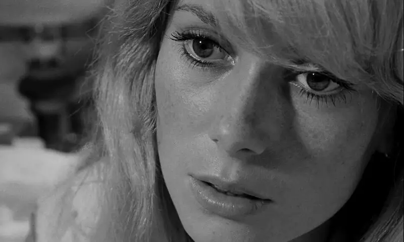 In this image from Repulsion, Catherine Deneuve's character Carol Ledoux is depicted in close-up, gazing to her right.