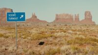 A sign in monument valley marking the spot where Forrest Gump fictionally ended his cross country marathon in the film of the same name