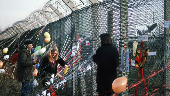 Protestors decorate the fences around Greeham military base