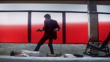 Image from Tokyo Drifter: A man with a gun stands over the lifeless body of a woman