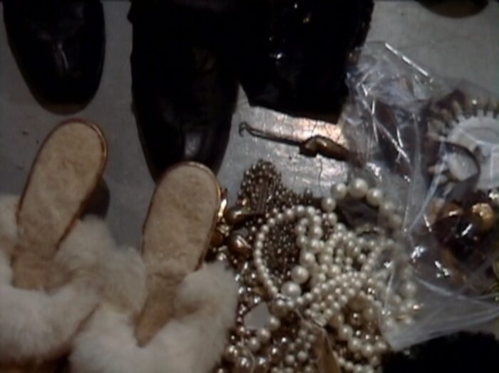 Still from The Fancy, one of December's Criterion Channel short film recommendations. A collage of random items, such as slippers and a pearl necklace.
