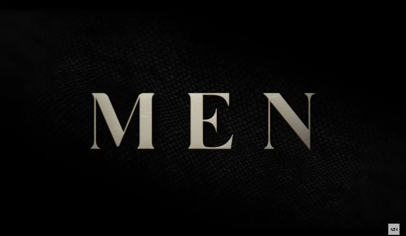 'MEN' title card. Gold text set against black snake skin.