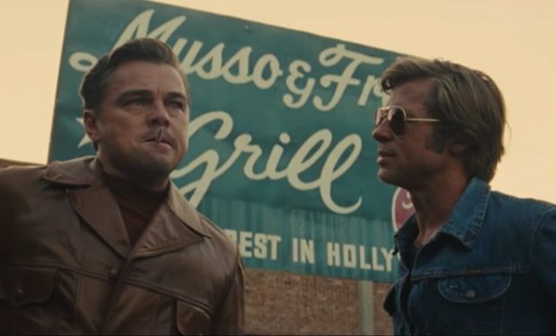 Cliff Booth (Brad Pitt) comforts his best friend Rick Dalton (Leonardo DiCaprio) as he worries about his career in ONCE UPON A TIME... IN HOLLYWOOD