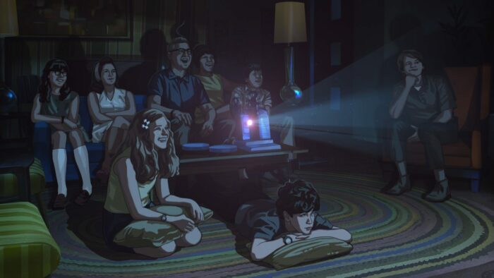 A family gathers in their living room to watch a projected film.